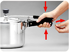 Step 1: hold the body handle and lid handle together in the closed position