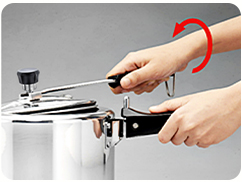 Step 3: keep rotating the lid handle until the lock disengages