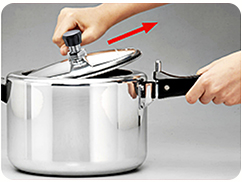 Step 5: grip the lid knob and lift the lid clear of the rim